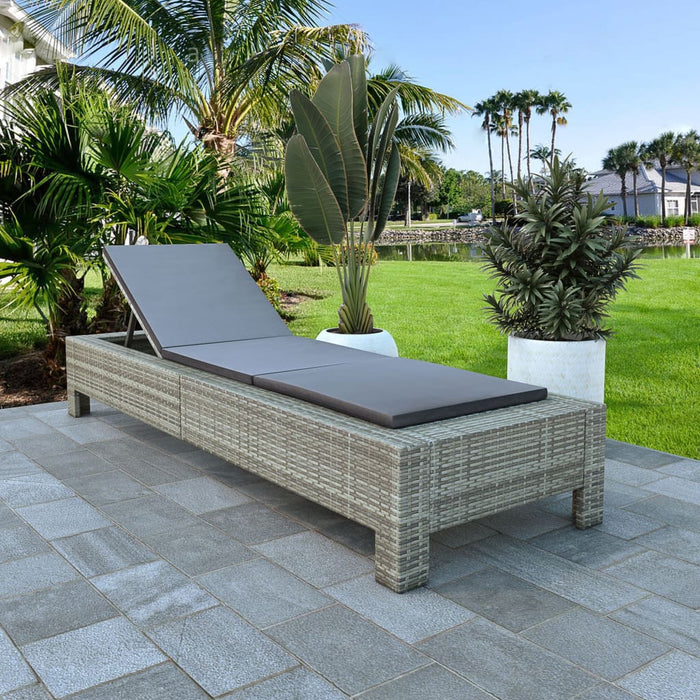 Sun lounger with gray poly rattan cushion